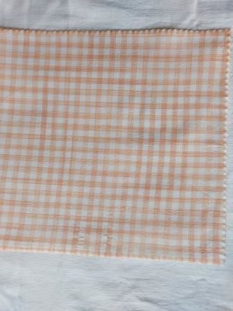 Cotton Tie and Dye Peach Checks Fabric-rotated